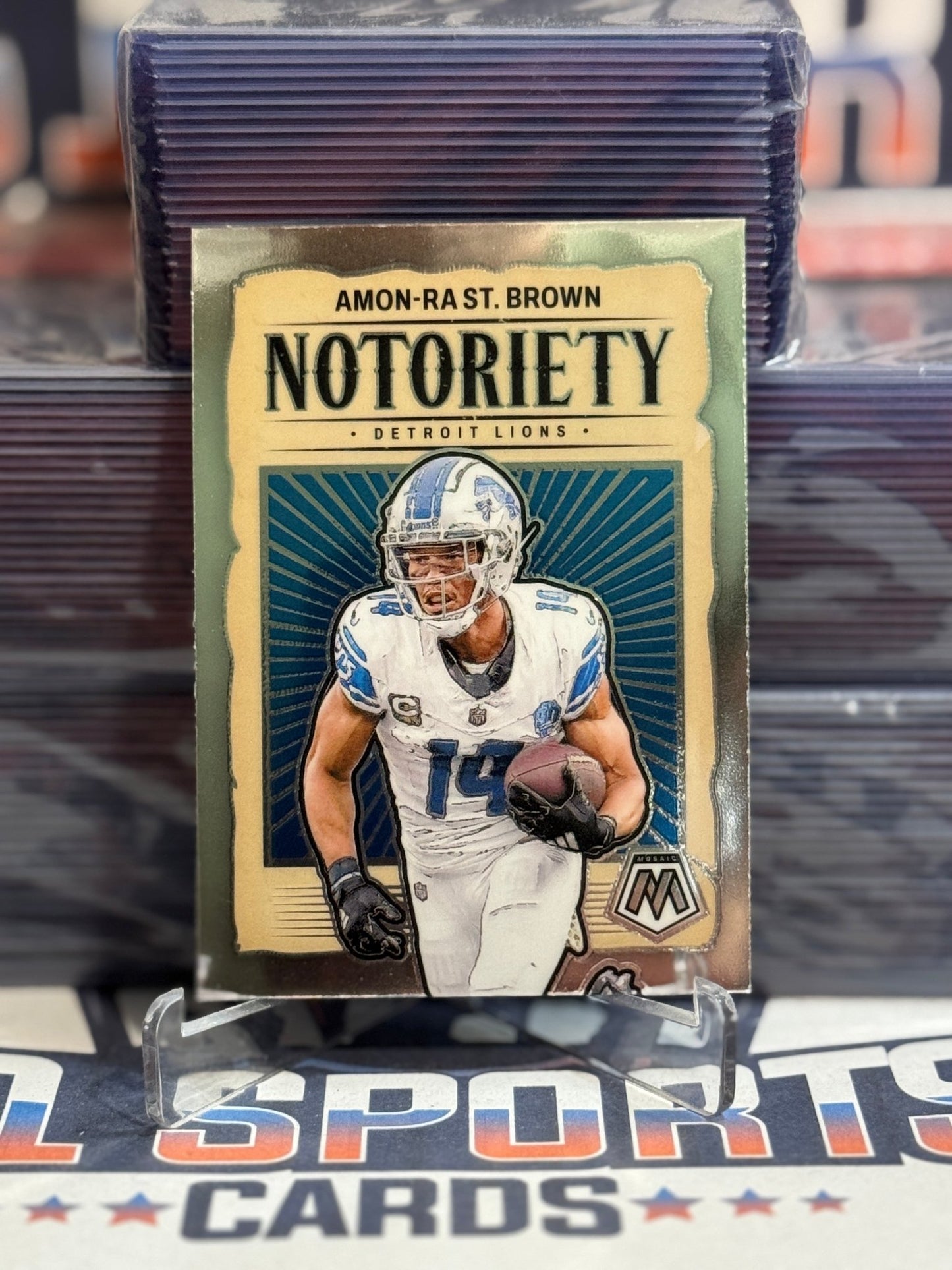 2025 Panini Mosaic (Notoriety) Amon - Ra St. Brown 12