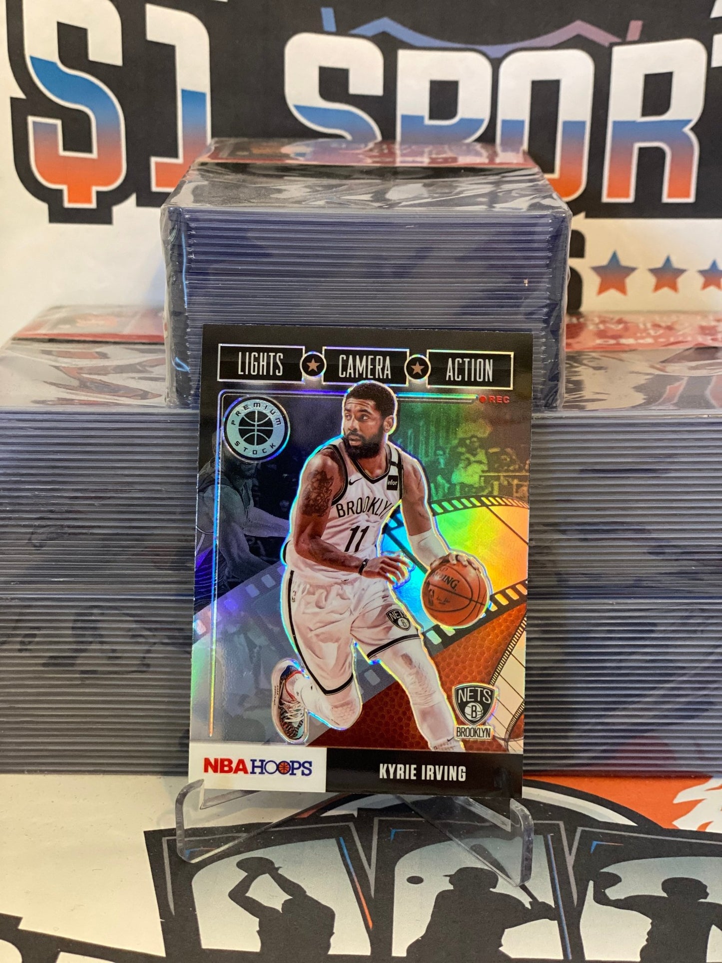 2019 Hoops Premium Stock (Holo Prizm, Lights Camera Action) Kyrie Irving #23