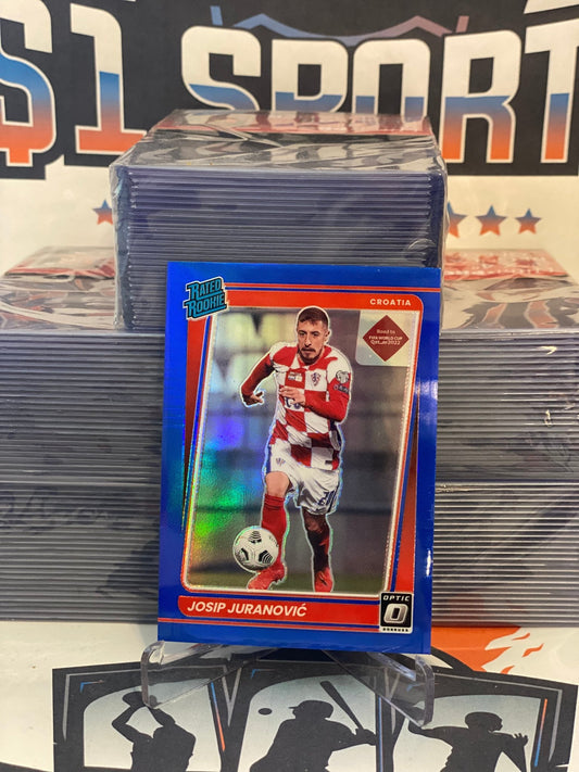 2021 Donruss FIFA World Cup (Blue Prizm, Optic, Rated Rookie 84/99) Josip Juranovic #184