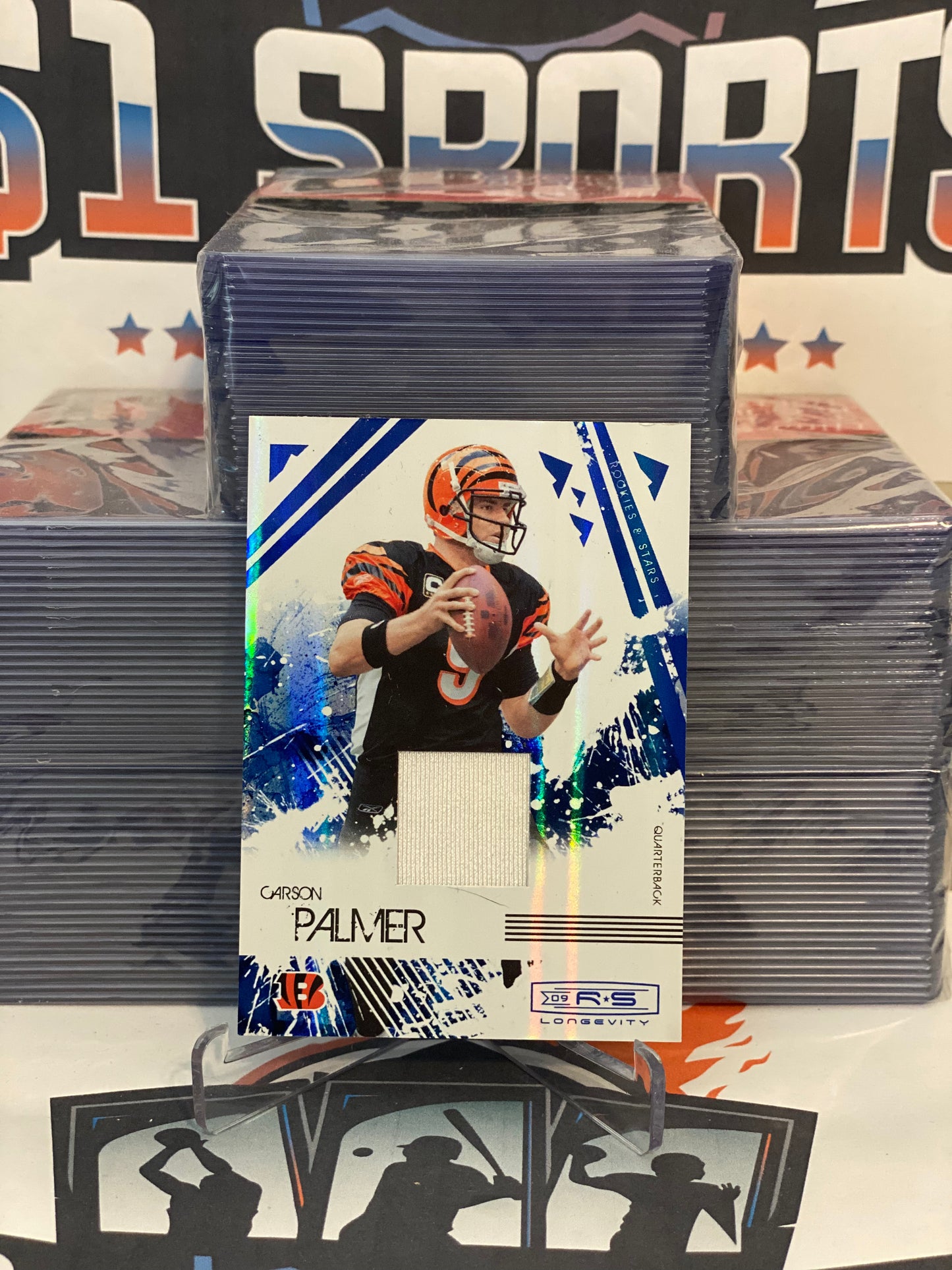 2009 Panini Rookies & Stars (Blue Longevity Relic 006/100) Carson Palmer #20