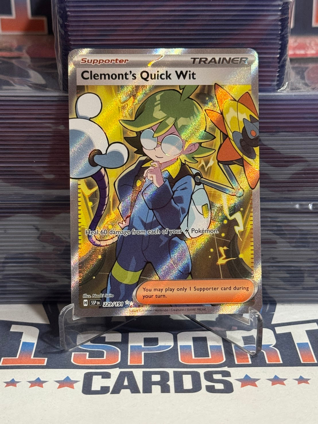 Pokemon TCG: Surging Sparks - Clemont's Quick Wit (Ultra Rare) #229