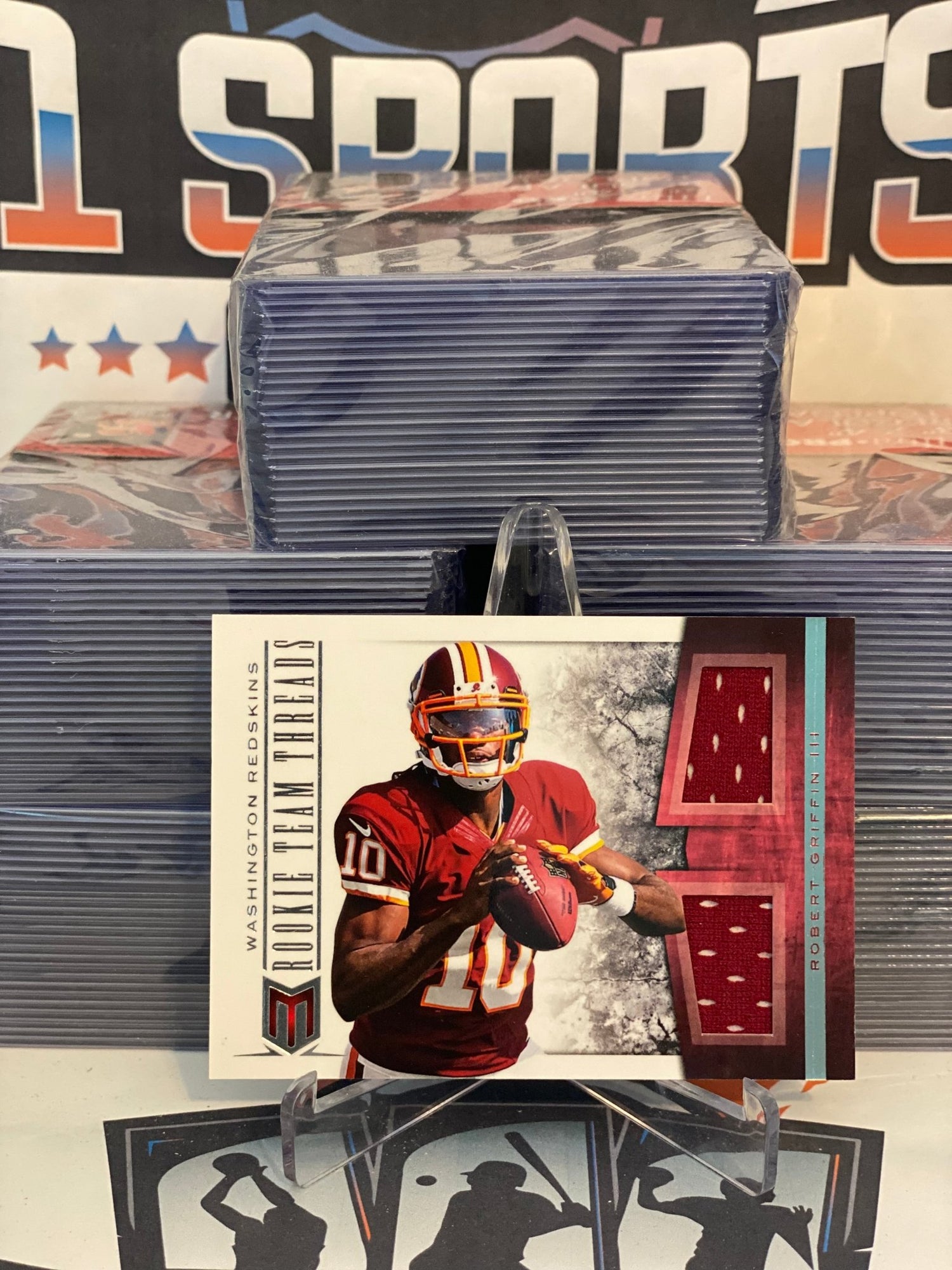 2012 Panini Momentum (Rookie Team Threads Relic 128/199) Robert Griffin III #2