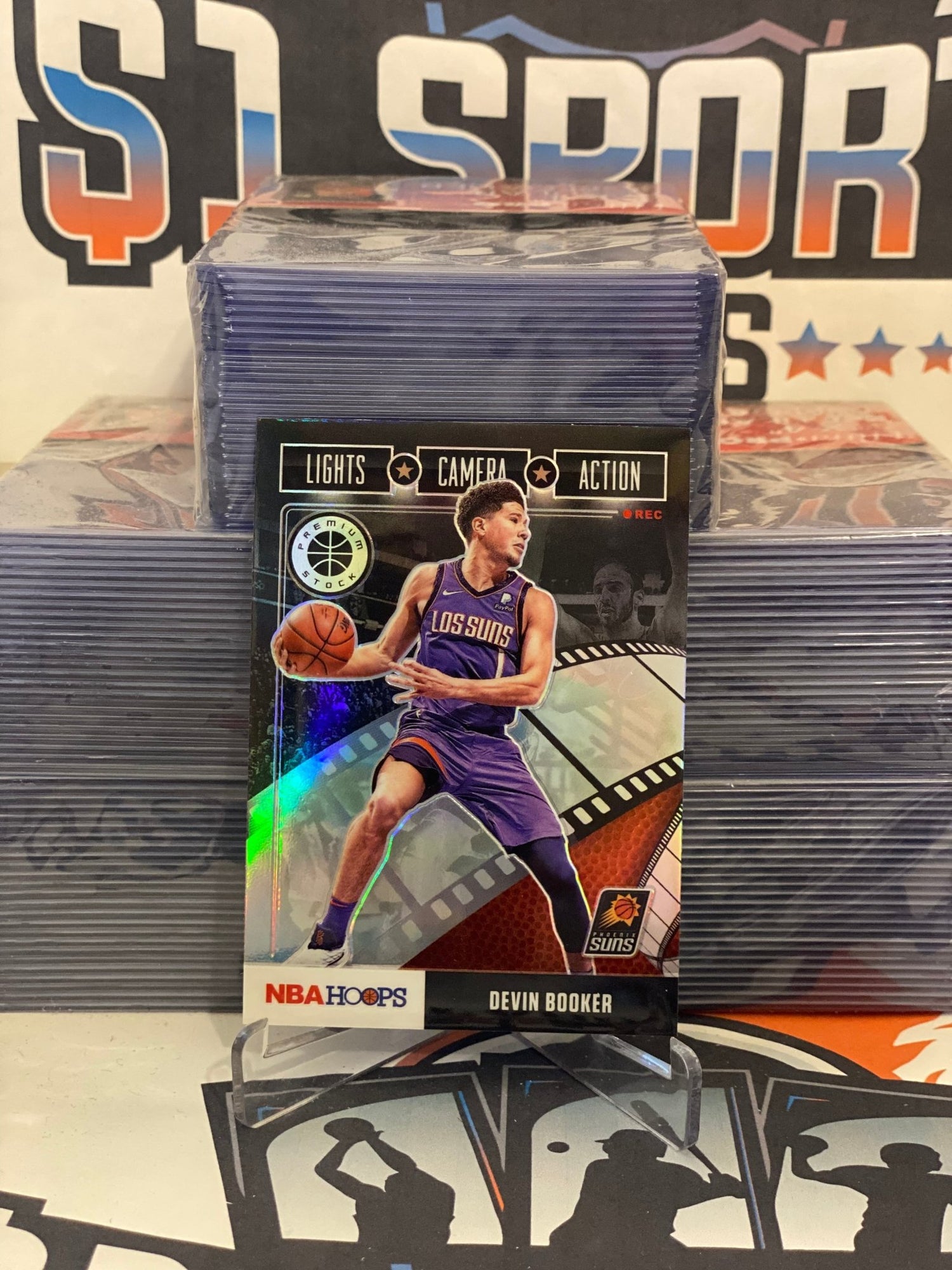2019 Hoops Premium Stock (Holo Prizm, Lights Camera Action) Devin Booker #25