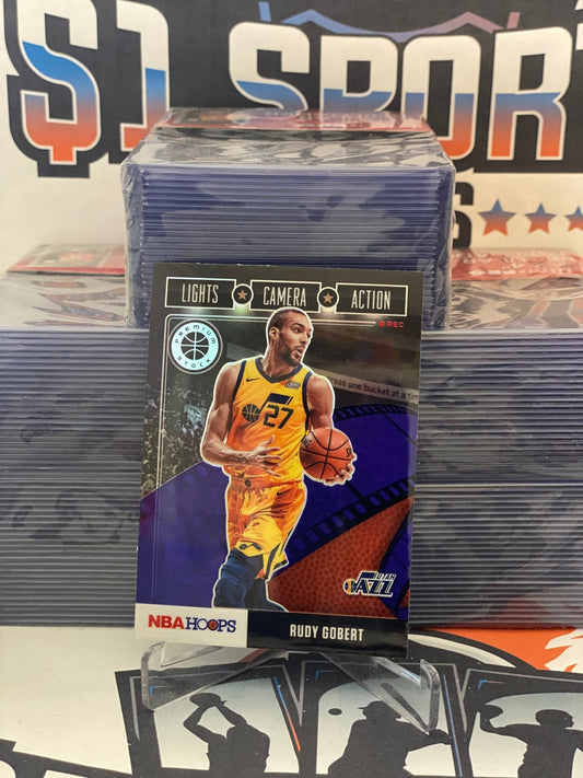 2019 Hoops Premium Stock (Purple Prizm, Lights Camera Action) Rudy Gobert #21