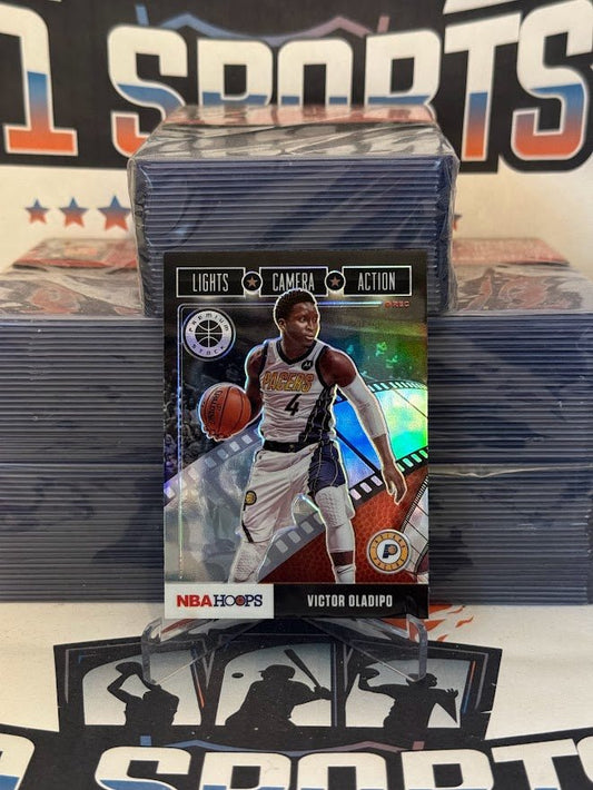 2019 Hoops Premium Stock (Silver Prizm, Lights Camera Action) Victor Oladipo #7