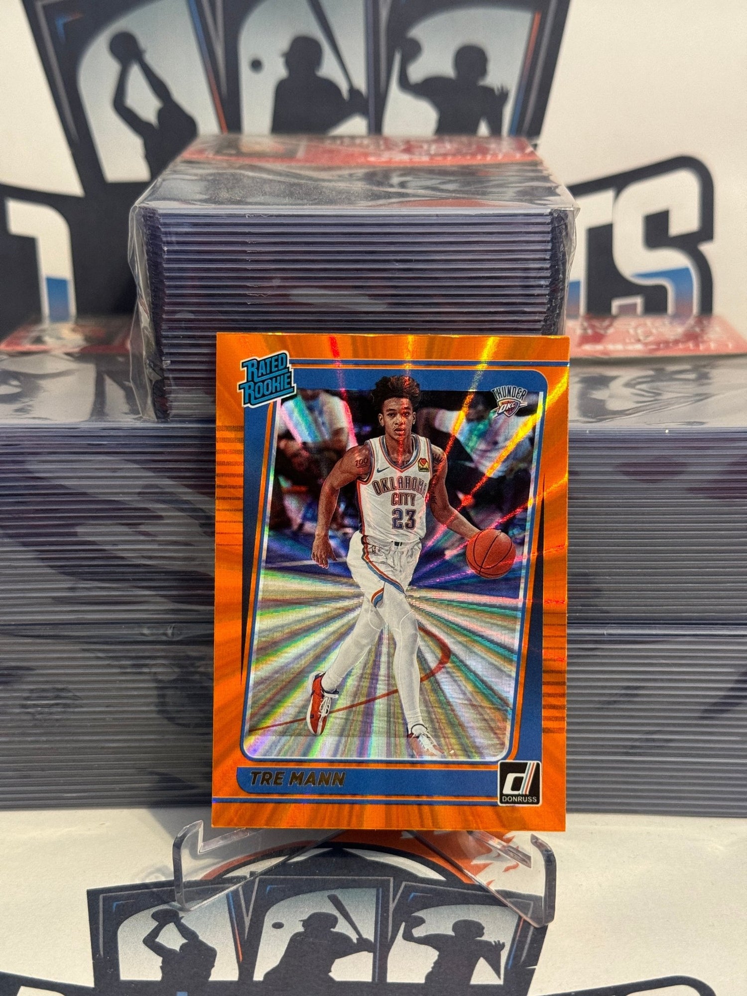 2021 Donruss Optic (Orange Laser Prizm, Rated Rookie) Tre Mann #218