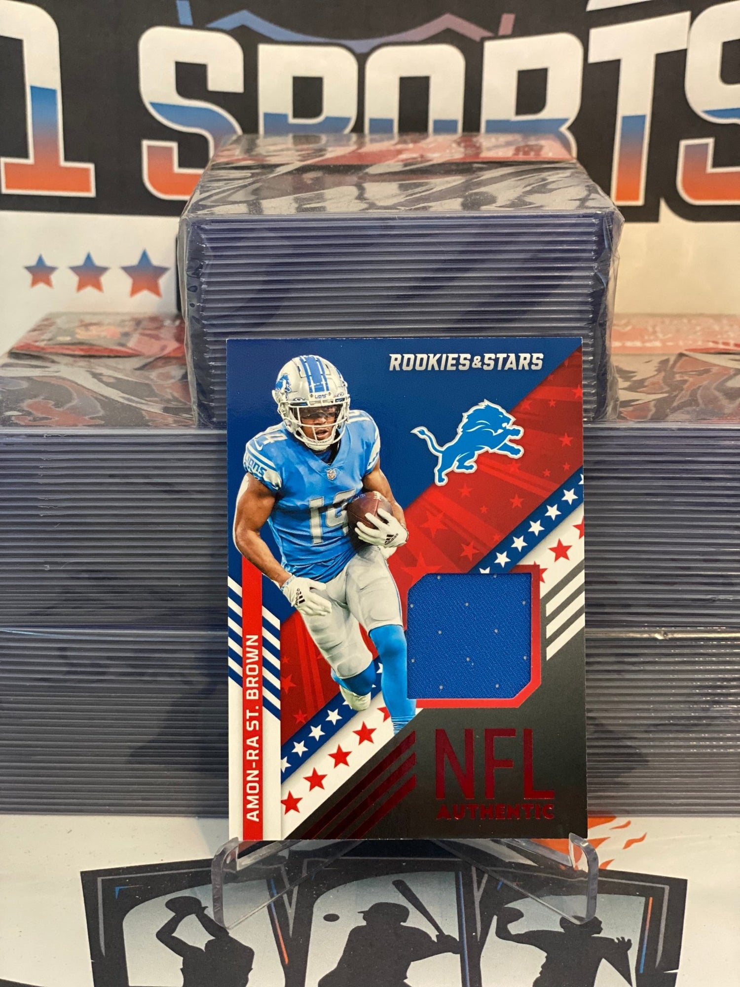 2022 Panini Rookie & Stars (Red Relic) Amon-Ra St. Brown #NA-ASB