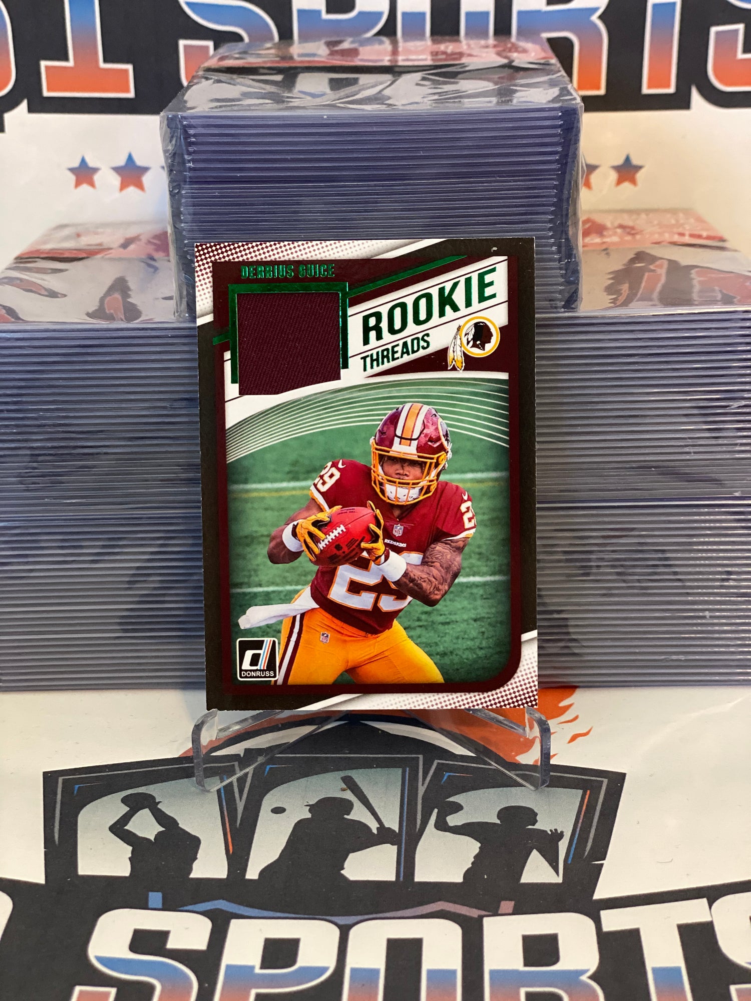 2018 Donruss (Green, Rookie Threads Relic) Derrius Guice #7